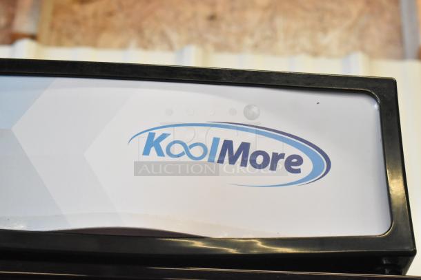 KoolMore KM-MDF-17S Slim Merchandiser Freezer, 6.5 Cu. Ft., new, scratch and dent, manual defrost, 115V, logo visible.