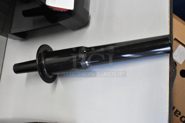 Alt text: Vita-Mix VM0101D blender tamper tool, black, shown next to the main unit.