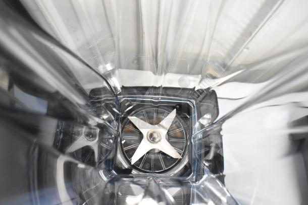Interior view of a Vita-Mix VM0101D blender pitcher, highlighting the stainless steel blades. Brand new, scratch and dent condition.