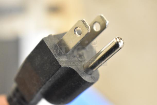Close-up of a standard power plug, part of the Avantco 194UCF280A ice machine, indicating its electrical compatibility.