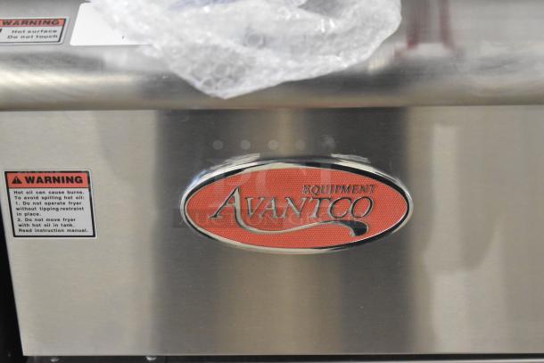 Brand new Avantco 177FF50L propane deep fryer, 120,000 BTU, with 2 metal fry baskets. Warning label on stainless steel surface.