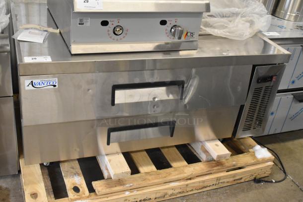 Brand new Avantco 178CBE52HC commercial chef base on casters, 2 drawers, 115V, scratches and dents visible on stainless steel.