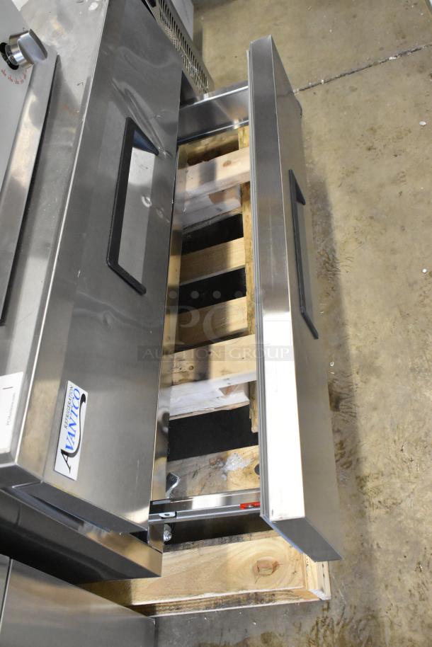 Brand new Avantco 178CBE52HC commercial chef base with two drawers, visible Avantco logo, on casters, 115V, 1 phase.