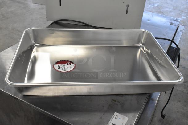 Vollrath 060248 aluminum baking pan, new condition, with a label indicating model and size.