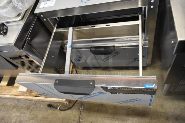 BRAND NEW Beverage Air stainless steel 2-drawer undercounter cooler. 115 volts, 1 phase. Visible "FREEZER" label. Scratch and dent condition.
