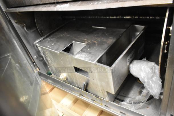 2 Hardt Inferno 3500 rotisserie ovens, 40-bird capacity each, 76,000 BTU, natural gas, stainless steel interior, used condition.