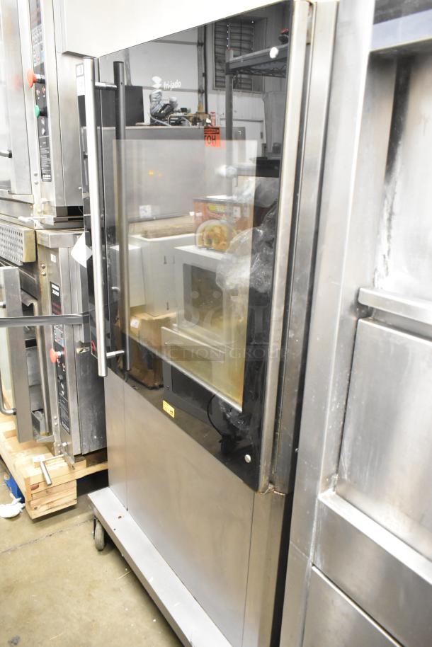 Fri-jado TDR7-P commercial rotisserie oven on casters, electric-powered, stainless steel finish, 208V, 3-phase, excellent condition.