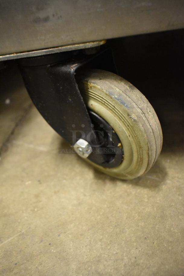 Fri-jado TDR7-P rotisserie oven caster, sturdy condition, suitable for commercial use.