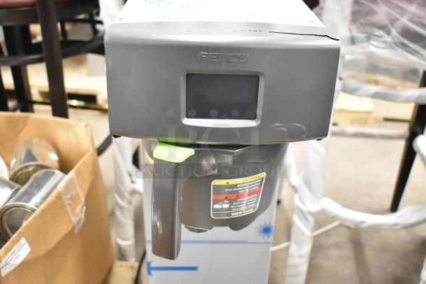 BRAND NEW SCRATCH AND DENT 2023 Fetco TBS-2121 Iced Tea Machine, 120V, 1 Phase. Minor scratches visible, commercial-grade.