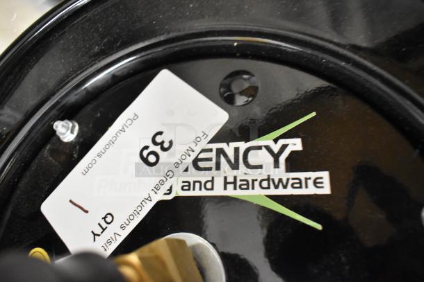 Brand new Regency Hose on Reel, with visible scratch and dent. Marked "Regency Plumbing and Hardware," quantity tag "39."