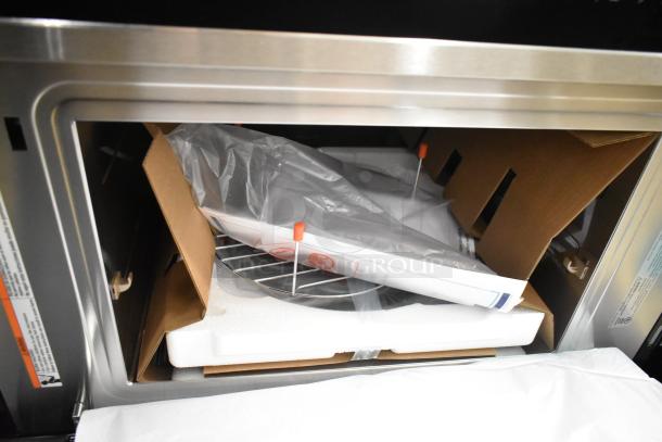 Brand new KoolMore KM-CWO30-SS 30" built-in microwave with convection oven, 1.6 cu. ft. capacity, stainless steel interior.