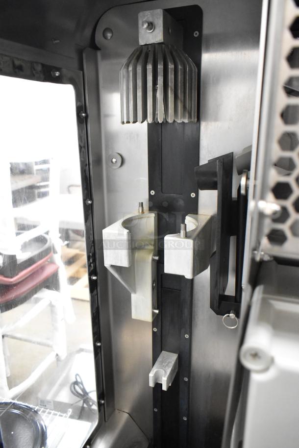 JBT 2ND-GEN-MFJ-HE commercial citrus juicer, stainless steel, on casters, 120V, floor style, good condition.