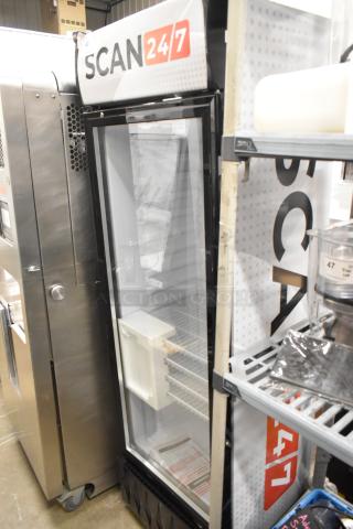 KoolMore MDR-9CP reach-in merchandiser refrigerator. Single glass door, 9 cu ft capacity, 115 volts, 1 phase, excellent condition.