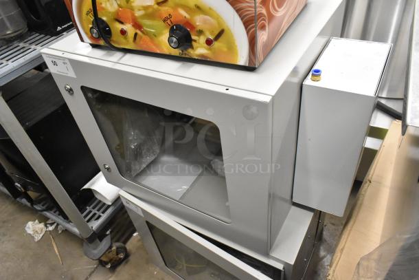 BlackShields DC0300 white metal air-conditioned technology cabinet, features glass window and control panel, good condition.
