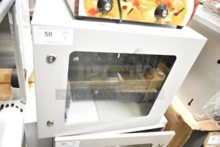 Brand new BlackShields DC0300 white metal air-conditioned technology cabinet, scratch and dent condition, no key included.