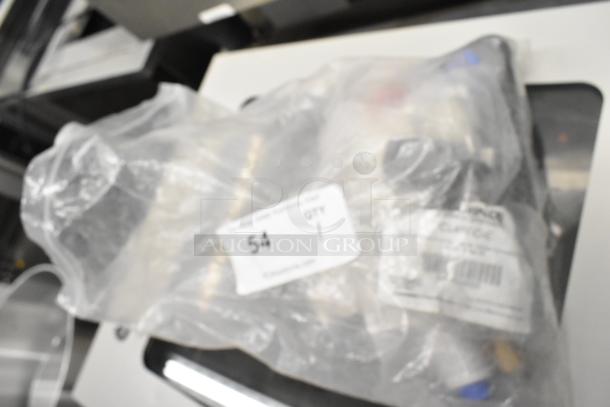 Lot of items including CLS40FB-D pin connector, CL40FC protective caps, in packaging, labeled with quantity and item codes.