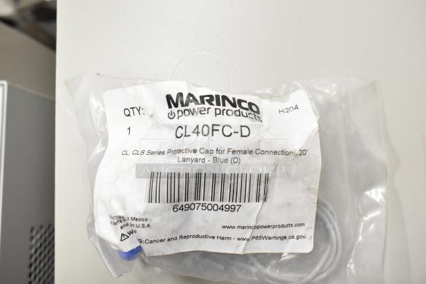 Lot featuring Marinco CL40FC-D protective cap, labeled for female connections, 20" lanyard, blue, new in packaging.