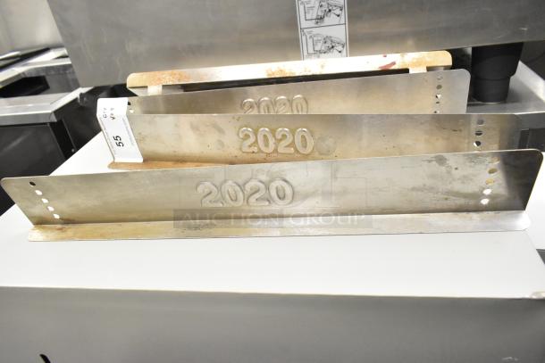 9 pieces for Turbochef Rapid Cook Conveyor Ovens, metal with "2020" markings, various conditions, auction lot tag visible.