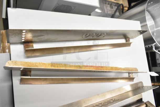 9 metal components for Turbochef Rapid Cook Conveyor Ovens, showing wear and markings. Multiply bid by 9 for total value.