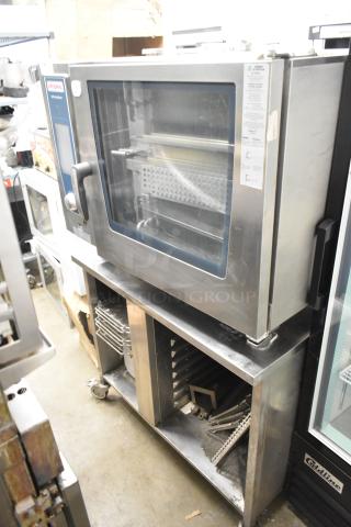 2019 Rational SCCWE62 convection oven on stand with casters, 480V, 3-phase, excellent condition, visible control panel.