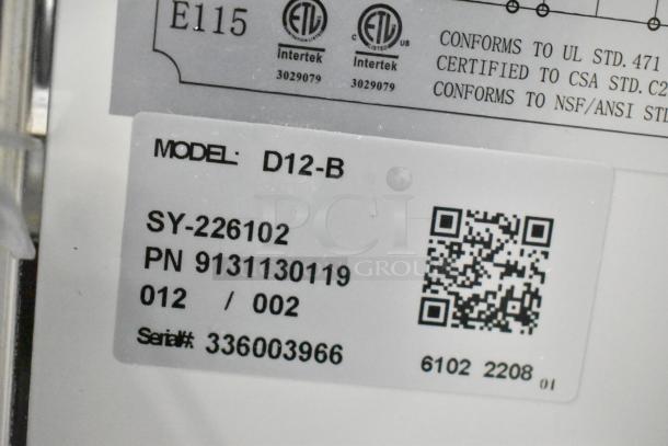 Coldline D12-B freezer label, showing model number, serial number 336003966, and certification details.