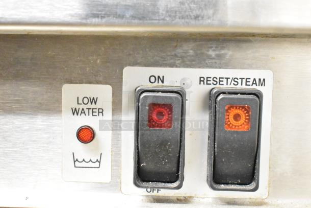 Cleveland PGM3002 steamer control panel; shows low water indicator and on/reset switches.