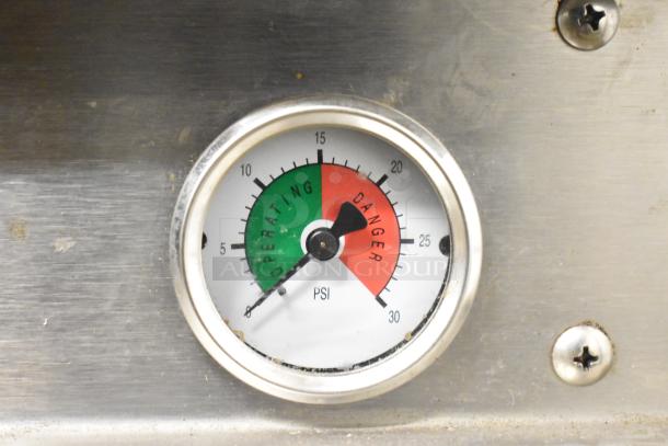 Cleveland PGM3002 pressure gauge on a commercial steamer. Indicators show operating and danger PSI levels.