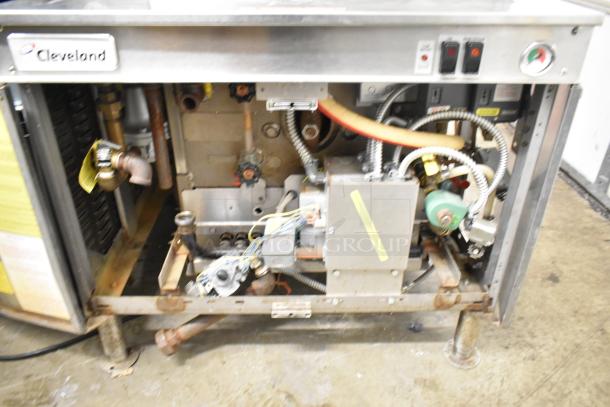 Cleveland PGM3002 commercial propane 16-pan pressure steamer with boiler base, 300,000 BTU, showing internal components.