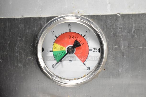 Gauge of Cleveland PGM3002 pressure steamer showing psi levels with marked zones: Operate, Caution, Danger.