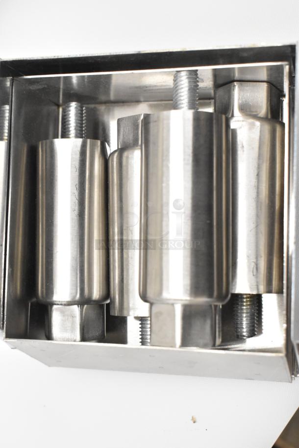 Stainless steel components packed in a metal box, likely assembly parts for Avantco 177EG30N electric griddle.