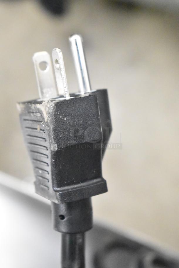 Power plug for Avantco 177EG30N commercial electric griddle, 208/240V, shown in close-up, brand new condition.