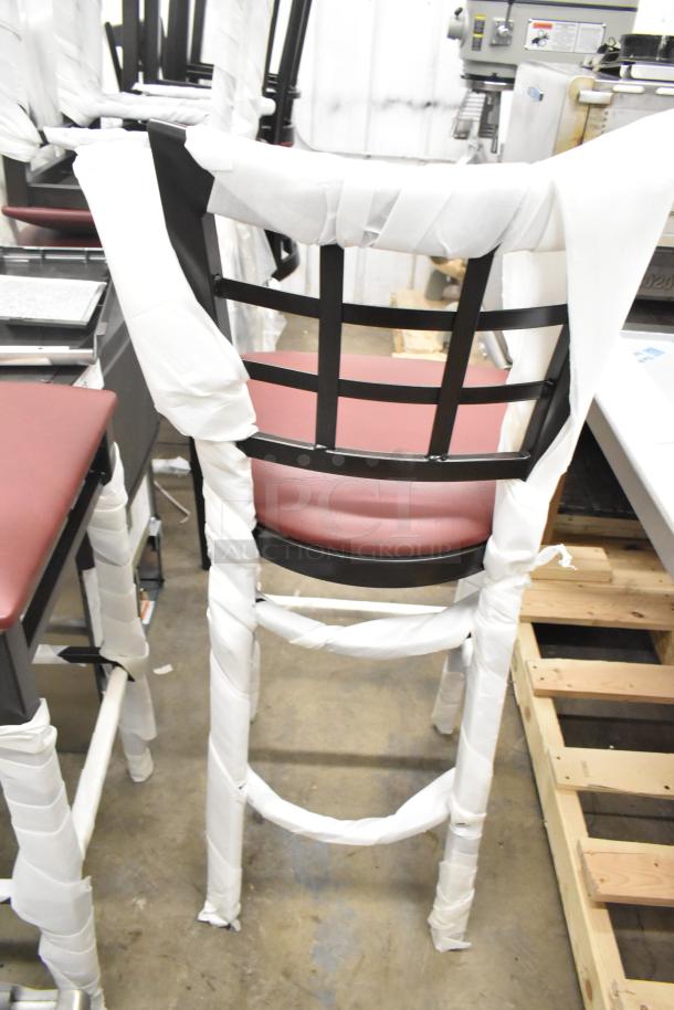 10 new Lancaster black window pane back bar stools with 164CUSHWGBU seat cushions, partially wrapped, minor scratches.