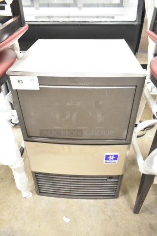 Manitowoc UDP0065A-161 commercial ice machine, 31 lb. bin, scratch and dent, new condition, 62 lb. capacity, 115 volts.