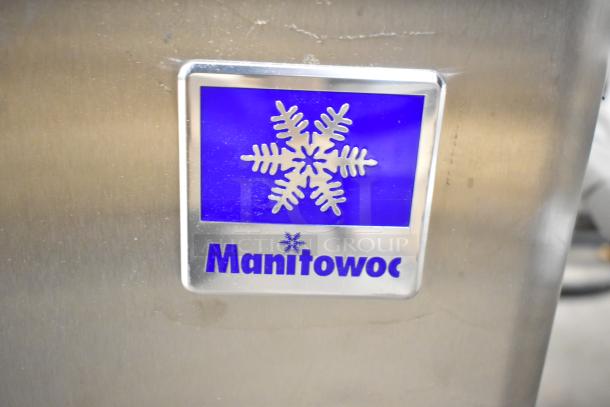 Manitowoc logo on a 2025 UDP0065A-161 undercounter ice machine. New with scratches and dents. 31 lb. bin, 62 lb. capacity.