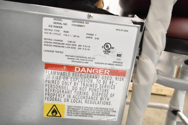 Manitowoc UDP0065A-161 ice machine, new, undercounter, 31 lb. bin, 62 lb. capacity, 115V, 1 phase. Warning labels visible.