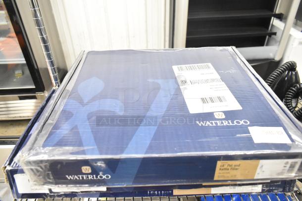 Brand new Waterloo Pot and Glass Filler Assembly 750PKFH68. Box labeled "Waterloo" with visible barcodes and shipping labels.