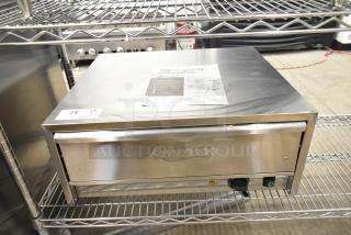 Brand new 2024 Avantco 177BW32 32 Bun Warmer, stainless steel, scratch and dent condition, 120V, 1 Phase, on metal shelf.