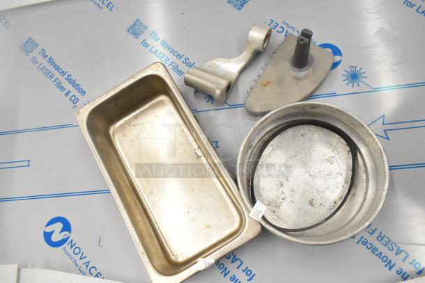 Boltic SHAG-K07F lot with stainless drop-in bin, round metal baking pan, and miscellaneous dishes in used condition.