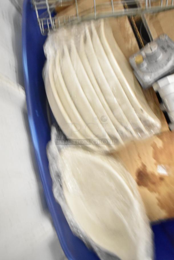 Lot of various items including Boltic SHAG-K07F stainless drop-in bin, round metal baking pan, wrapped dishes.