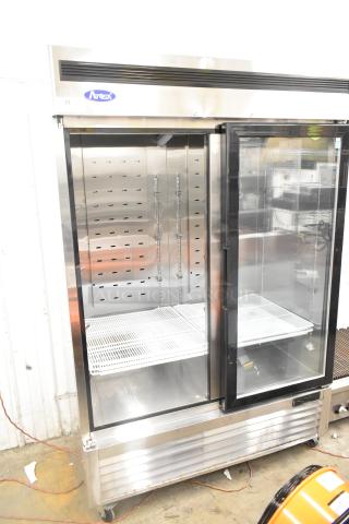 2021 Atosa MCF8703ES commercial 2-door reach-in freezer, poly-coated racks, on commercial casters, 115 volts, 1 phase.