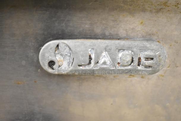 Jade Commercial Countertop Gas Charbroiler Grill with visible brand logo, stainless steel exterior, used condition.