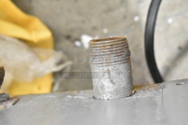 Aged Jade Commercial Countertop Gas Charbroiler Grill connector detail; visible rust and wear.