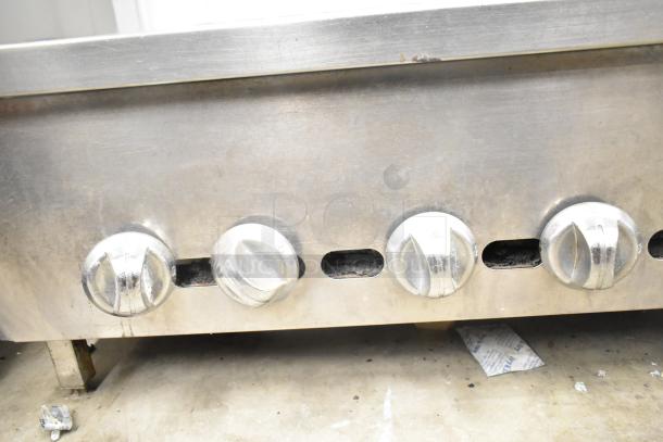 Jade commercial countertop gas charbroiler grill, stainless steel, four control knobs, good condition.