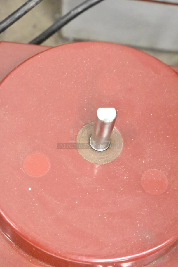 Robot Coupe R2N food processor base, red, single-phase, 120V, used condition, attachment hub visible.