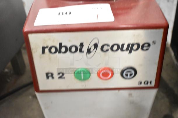 Robot Coupe R2B Countertop Food Processor Base, 120V, 1 Phase, visible wear, front buttons for operation control.