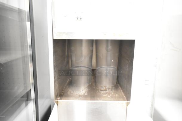 Bunn ICDD-3 stainless steel commercial countertop reservoir, features durable design, suitable for beverage dispensing, showing signs of use.