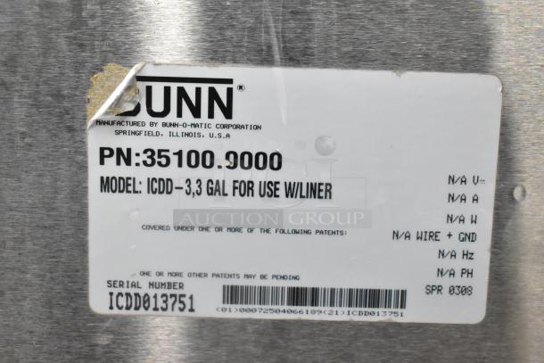 Bunn ICDD-3 stainless steel reservoir; label shows model, part number, and serial number for commercial use.