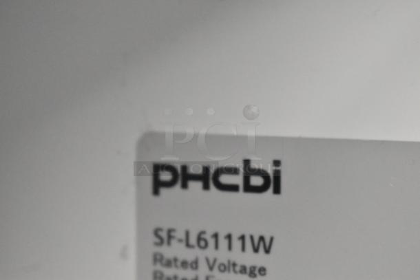 PHCBI SF-L6111W single door undercounter cooler label, showing model and make details.