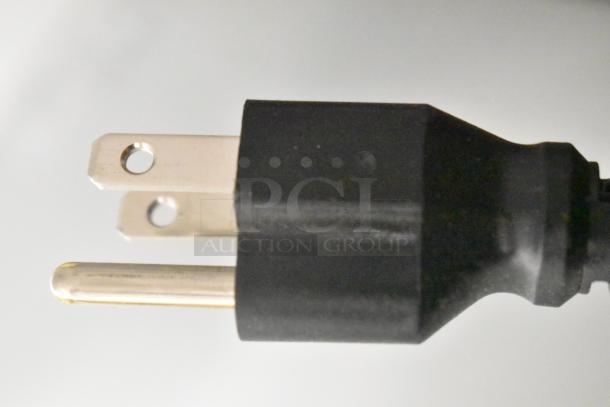 Close-up of a black, three-pronged power plug for the Avantco 178A19FHC commercial freezer, 115 volts, 1 phase.