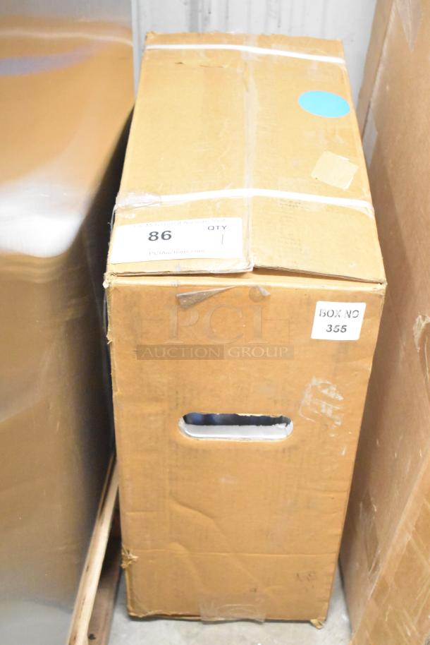 Cardboard box containing Regency 600HRSS50NS stainless steel hose reel, 50' x 3/8" hose, new with minor scratches.